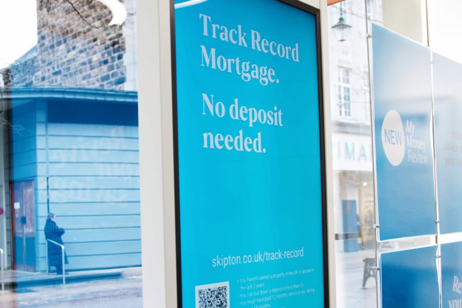 Digital screen displayed in branch - Track Record Mortgage
