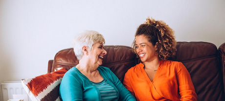 Woman and older woman laughing