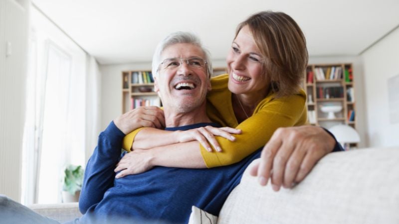 Smiling couple hugging