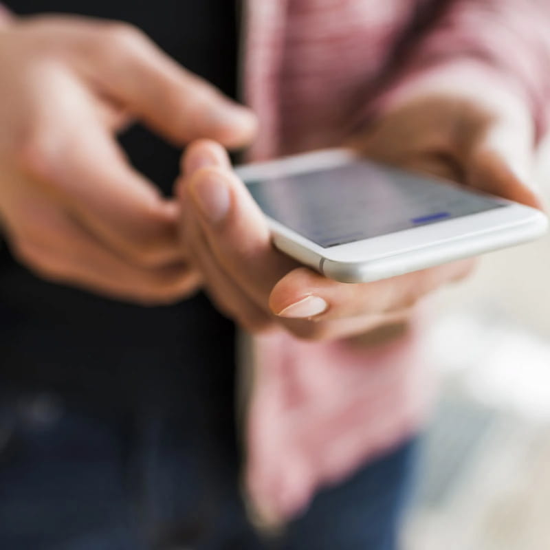 Person using their mobile phone